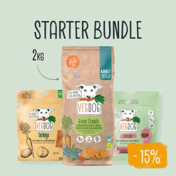 Starter-Bundle mit Vegdog-Produkten: 2 kg Green Crunch Hundefutter, Jerkeys und Dentals, mit einem 15%-Rabattetikett.