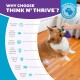 Ein Corgi spielt mit einem lila Spielzeug, das von einer Person gehalten wird, und zeigt die Vorteile von "Think N' Thrive" wie sensorische Stimulation und Angstabbau.