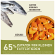 Das Bild zeigt Lachs, Hering und Meerforelle mit Kürbisstücken und betont "65% Zutaten von kleinen Beutetieren."