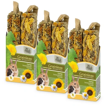 Drei Pakete JR FARM grainless Haustierfutter, mit getrockneten Blumen und Kräutern, mit Bildern eines Kaninchens und eines Meerschweinchens auf der Vorderseite.