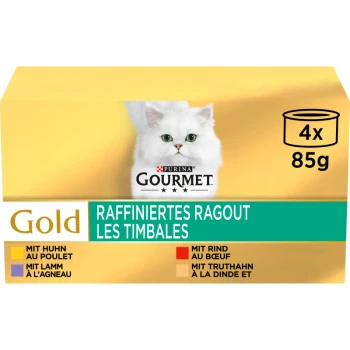 Packung mit vier 85g Dosen Purina Gourmet Gold Katzenfutter, mit einer weißen Katze auf der Vorderseite und Geschmacksrichtungen: Huhn, Rind, Lamm und Truthahn.