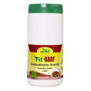 Behälter von cdVet Fit-BARF Gemüseflocken, beschriftet "Gemüseflocken Dreierlei," mit einem grünen Deckel und natürlichen Zutaten.