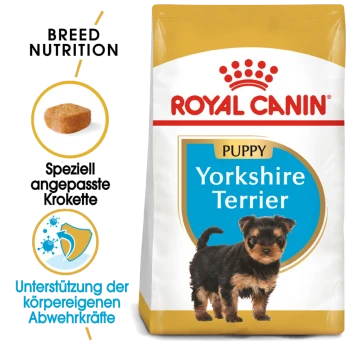 Royal Canin Welpen Yorkshire Terrier Hundefutterbeutel mit einem kleinen Yorkshire Terrier Welpen, mit Text, der die Rassenernährung und Immununterstützung hervorhebt.