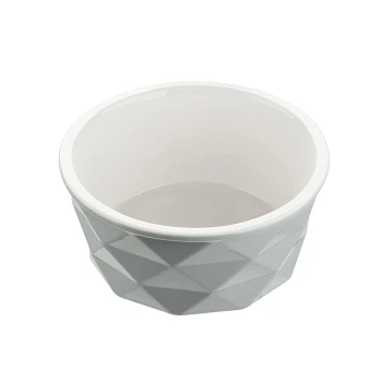 Graue geometrische Futterschüssel für Haustiere mit glänzendem weißen Innenraum, mit facettiertem Design.