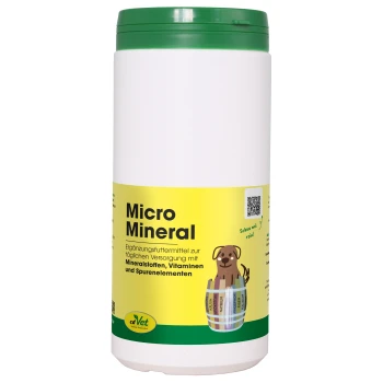 Behälter mit cdVet MicroMineral, einem natürlichen Haustier-Nahrungsergänzungsmittel, mit einem grünen Deckel und einem Etikett mit "100% NATUR" und Produktdetails.