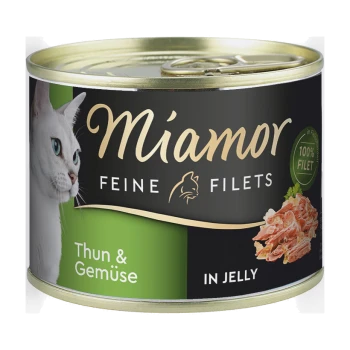 Puszka karmy dla kotów z białym kotem na etykiecie, z napisem 'Miamor Feine Filets Thun & Gemüse in Jelly' oraz '100% Filet.'