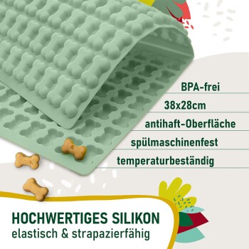 Gelbe Silikonform für Haustierleckerlis mit Knochenformen, Maße 38x28cm, BPA-frei, spülmaschinenfest und temperaturbeständig.