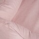 Nahaufnahme eines weichen, rosa Haustierbettes mit plüschigem Stoff und gepolsterten Kanten, ideal für kleine Haustiere, um bequem zu ruhen.