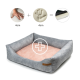 Ein plüschiges Haustierbett mit grauem Äußeren und weichem rosa Innenleben, mit einem Pluszeichen-Symbol und Icons, die 4 cm Dicke für Komfort anzeigen.