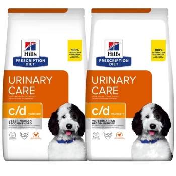 Deux sacs de nourriture pour chiens Hill's Prescription Diet Urinary Care c/d Multicare, présentant un chien noir et blanc sur l'emballage.