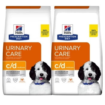 Zwei Beutel Hill's Prescription Diet Urinary Care c/d Multicare Hundefutter, mit einem schwarz-weißen Hund auf der Verpackung.