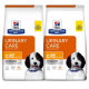 Zwei Beutel Hill's Prescription Diet Urinary Care c/d Multicare Hundefutter, mit einem schwarz-weißen Hund auf der Verpackung.