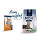 Happy Cat Futterverpackung mit einem kleinen Beutel "adult atlantik-lachs" und einem größeren Beutel "Culinary 1+ Jahre" mit einer getigerten Katze.