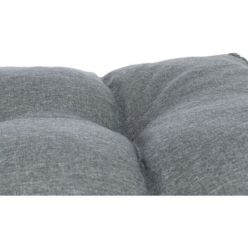 Nahaufnahme eines plüschigen, grauen Haustierbettes mit einem gepolsterten Design, das seine weiche Textur und bequeme Polsterung zeigt.