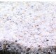 Nahaufnahme von feinem weißen Sand mit kleinen Körnern in verschiedenen Schattierungen, geeignet für Haustierlebensräume oder Aquarien.