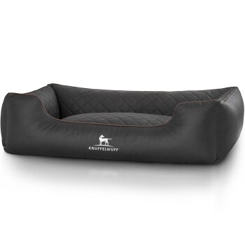 Schwarzes, gestepptes Hundebett mit erhöhten Seiten und einem Logo mit der Aufschrift 'KNUFFELWUFF' auf der Vorderseite.
