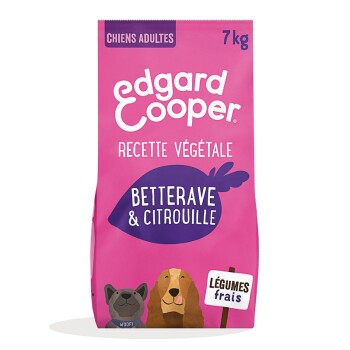 Sac de nourriture pour chiens Edgard Cooper de 7 kg avec un fond rose, étiqueté "Recette Végétale," présentant des chiens de dessin animé et "Légumes frais."