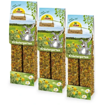 Drei Pakete von JR FARM Farmys Kräutergarten, mit einem Cartoon-Hasen und einer bunten Kräutermischung, vor einem Feldhintergrund.