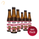 Sechs braune Flaschen von TJURE Superfood für Hunde, beschriftet mit "Huhn mit Beeren," mit einem glücklichen Hund auf dem Etikett und einem "6er Pack"-Abzeichen.