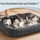 Sibirischer Husky schläft auf einem grauen, gerippten, weichen Hundebett auf Holzboden; Text oben: 'Komfortabel wie auf Wolke 7'.