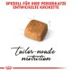 Futterkibble, das speziell für Perserkatzen entwickelt wurde, mit einem braunen quadratischen Stück Futter und dem Text "maßgeschneiderte Ernährung" darunter.