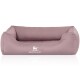Ein plüschiges, mauvefarbenes Hundebett mit erhöhten Seiten und einem weißen "KNUFFELWUFF"-Logo auf der Vorderseite, entworfen für den Komfort des Haustiers.