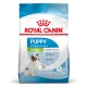 Sac de nourriture pour chiot Royal Canin, X-Small 2-10 mois, poids adulte jusqu'à 4 kg, image d'un petit chiot blanc et brun.