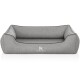 Graues Haustierbett mit modernem Design, mit einem erhöhten Rand und dem Logo "KNUFFELWUFF" auf der Vorderseite.