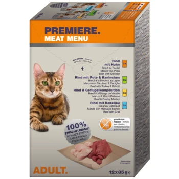 Meat Menu Adult 12x85g Eine grünäugige Katze sitzt neben einer Box mit der Aufschrift "Premiere Meat Menu" mit 12 Packungen Katzenfutter und einem "100% Frisches Fleisch"-Siegel.