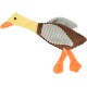 A plush duck toy with a yellow head, orange beak, and brown, gray, and cream body, featuring textured fabric and orange legs.