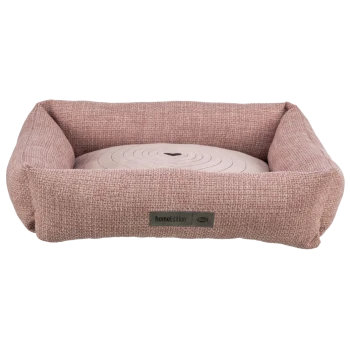 Ein gemütliches Haustierbett mit einem pinken, strukturierten Stoff und einem runden Kissen mit einem Herzdesign in der Mitte, beschriftet mit "homeEdition."