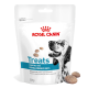 Royal Canin Hundeleckerli-Packung mit einem schwarz-weißen Hund, beschriftet mit 'Leckerlis kompatibel mit hypoallergenen Diäten', 230g.