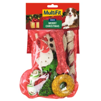 A festive MultiFit pet snack pack labeled "Merry Christmas" with a red bone, green and red chews, and a yellow donut in a clear bag.