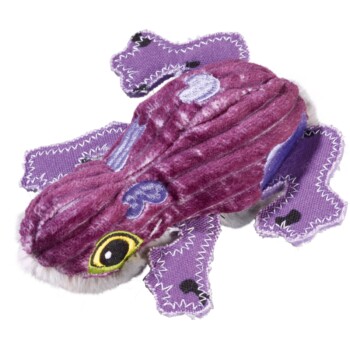 Lila Plüschhaustier-Spielzeug in Form eines Käfers, mit gestickten Details und einer weichen Textur, umgeben von Stoffresten.