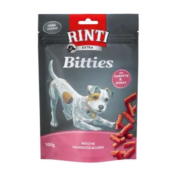 Verpackung von Rinti Bitties Hundeleckerlis mit einer verspielten Hundillustration, mit dem Text "Weiche Huhnstückchen" und "mit Karotte & Spinat."
