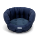 Marineblaues Haustierbett mit einem plüschigen, gesteppten Design und runder Form, mit einem kleinen "Doctor Bark"-Logo.