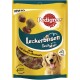 Pedigree Tasty Minis Hundeleckerlis in einer gelben Tüte, mit Geschmacksrichtungen von Huhn und Ente, mit weniger als 12 kcal pro Leckerli.