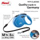 Blue flexi retractable dog leash with ergonomic grip, high-strength cord, and comfortable braking system; suitable for dogs up to 20 kg.
