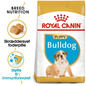 Royal Canin Bulldog Puppy voerzak met een afbeelding van een puppy, met tekst die de voeding voor het ras en immuunondersteuning benadrukt.