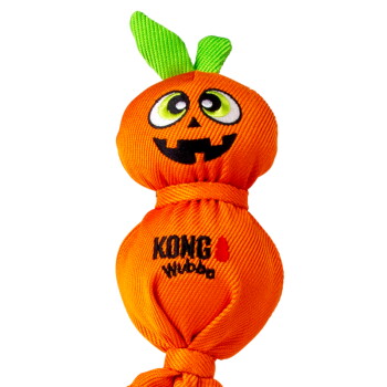 Orange KONG Wubba pumpkin dog toy with jack-o'-lantern face, green leaf ears and knotted body