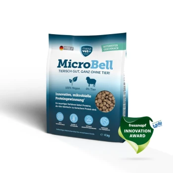 4 kg Sack MicroBell veganes Hundefutter mit Symbolen für Verdaulichkeit, glutenfrei, Nährstoffe und niedriger CO2-Fußabdruck. Deutscher Text enthalten.
