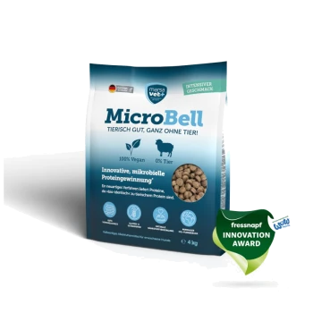 4 kg Sack MicroBell veganes Hundefutter mit Symbolen für Verdaulichkeit, glutenfrei, Nährstoffe und niedriger CO2-Fußabdruck. Deutscher Text enthalten.