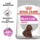 Sac de nourriture pour chiens Royal Canin Relax Care Medium avec illustration de chien, promouvant l'adaptation et une amélioration de +44 % des comportements normaux.