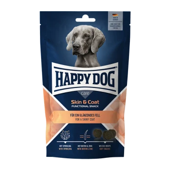 Opakowanie funkcjonalnych przekąsek Happy Dog Skin & Coat z szarym psem na przodzie, z tekstem w języku niemieckim i angielskim o korzyściach dla błyszczącej sierści.