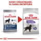 Dwie torby karmy dla psów Royal Canin oznaczone "MAXI Sterilised" i "Sterilised MAXI", z ilustracją psa i napisem "Utrzymuje idealną wagę."