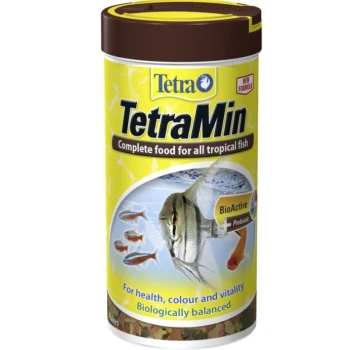 TetraMin fish food container with a yellow label stating "Complete food for all tropical fish" and "BioActive + Prebiotic" for health.
