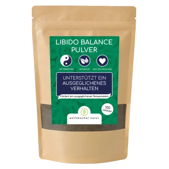 Ein braunes Päckchen mit der Aufschrift 'Libido Balance Pulver' mit grünen und blauen Akzenten, das 'Unterstützt ein ausgewogenes Verhalten' für Hunde angibt, 100 Gramm.