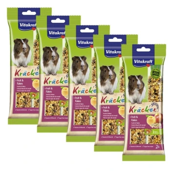 Cinq paquets de Vitakraft Kräcker pour cobayes, étiquetés "Fruit & Flakes", avec des images de cobayes et de fruits.