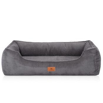 Graues Cord-Bett für Haustiere mit erhöhten Rändern und einem Lederetikett mit Hundesilhouette, entworfen für Komfort und Stil.