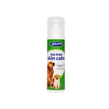 Johnson's Veterinary Tea Tree Skin Calm spray for dogs, with two dog photos; reads: soothes & calms itchy skin, anti-bacterial